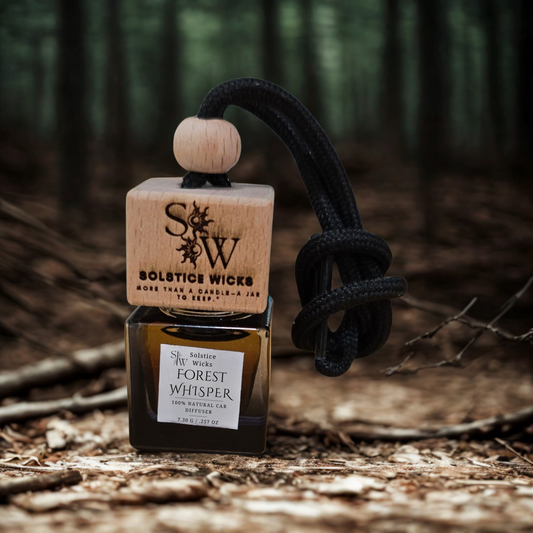 Hanging car diffuser labeled “Forest Whisper” with pine needles, eucalyptus globulus leaves, and peppermint — fresh forest-inspired essential oil blend for cars.